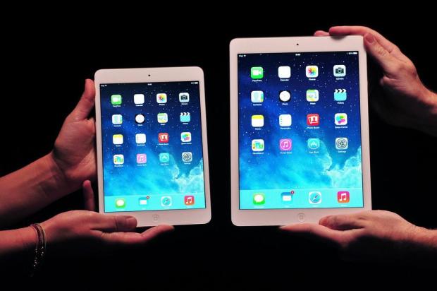 Eletrônicos com níquel, como o iPad, podem causar alergia na pele CARL COURT/AFP