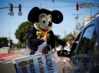 Quem é o Mickey que vende pipoca em sinal da Avenida Ipiranga porque "a Minnie está grávida" André Ávila / Agencia RBS/Agencia RBS